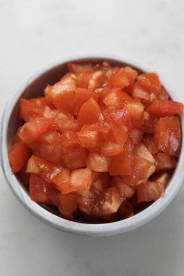 Chopped tomatoes in a bowl.