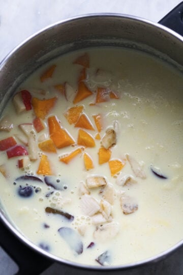 Fruit added to custard milk sauce.