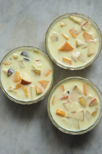 Fruit custard served in small bowls.
