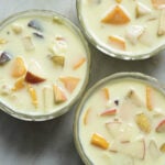 Three small bowls of Indian fruit salad.