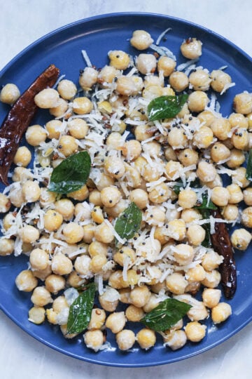 Chana sundal in a blue plate.