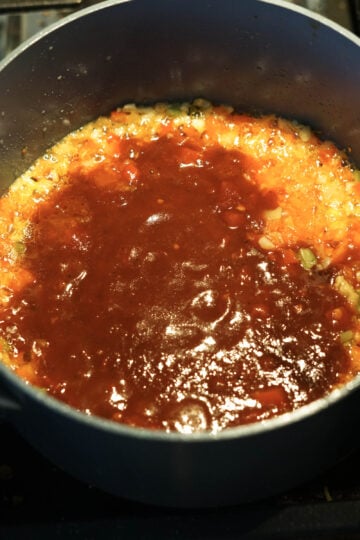 Sauces added to pan.