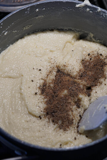 Milk barfi mixture with cardamom powder.