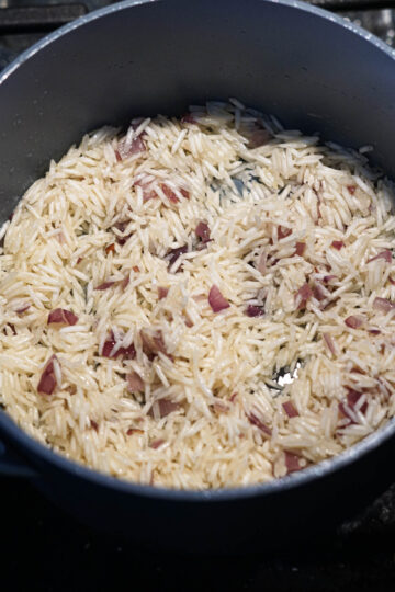 Basmati rice grains in a pot.