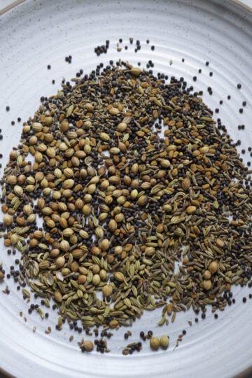 Achari spices cooling in a plate.