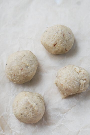 Four almond modak balls.