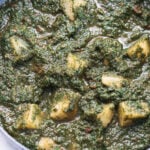 Saag aloo in a pot.