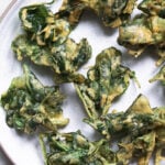 Spinach pakoras on a plate.
