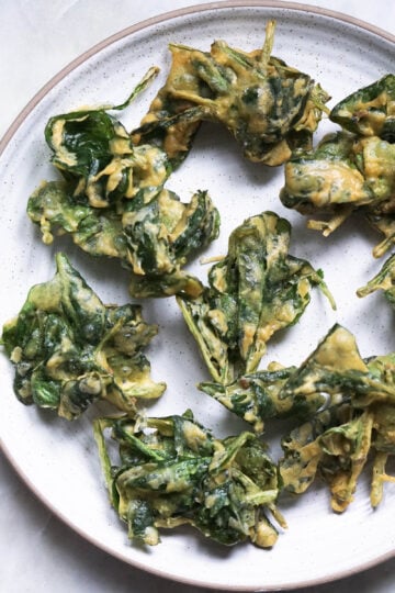Spinach pakoras on a plate.