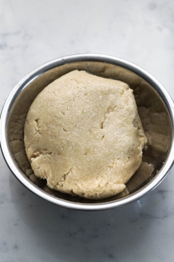 Soft coconut cookie dough in a bowl.