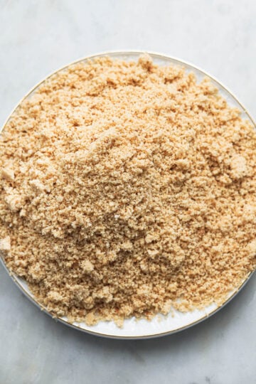 Ground hazelnuts on a plate.