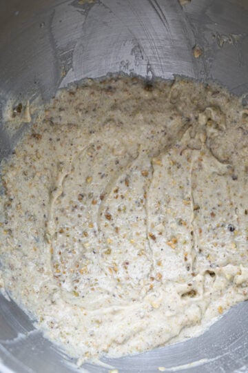 Kesar pista cupcake batter in a bowl.
