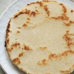 Almond flour roti on a plate.