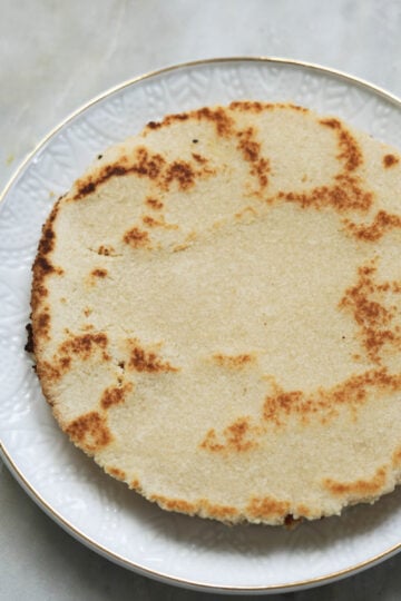 Almond flour roti on a plate.