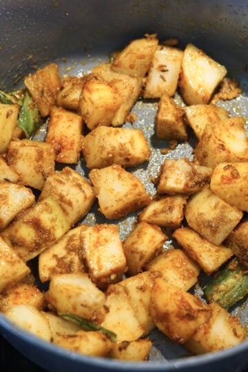 Spices added to pan.