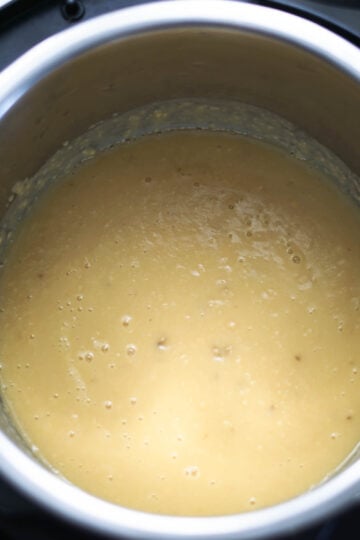 Creamy toor dal in a pot.
