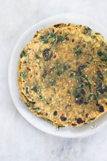 Roasted thepla on a plate.