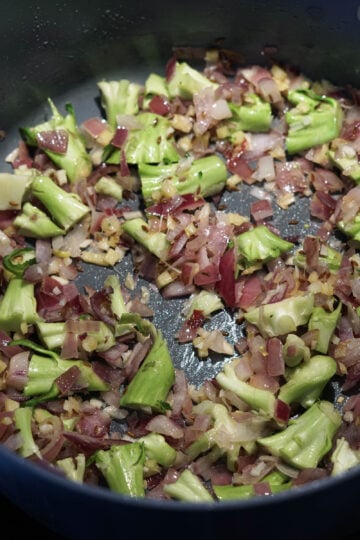 Broccoli stems added to the almond broccoli soup pot.